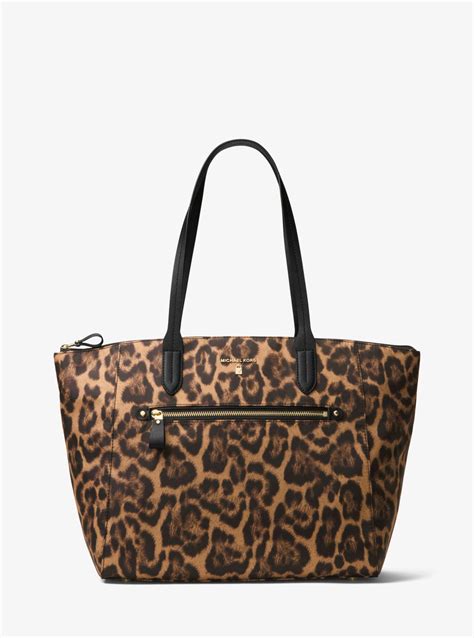 michael kors olive leopard coat|Michael Kors leopard tote.